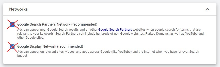 Screenshot from Google Ads showing the preselected default settings for Google Search Network and Google Display Network, which should be deselected.