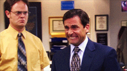 Animated image of TV show character Michael Scott with a cringing, grimacing expression on his face.